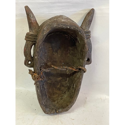 439 - Unusual  African Hand Carved Tribal Face Mask. 40 cms High