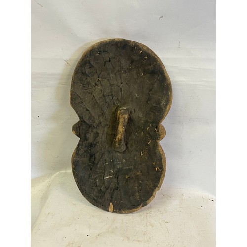 445 - African Hand Carved Tribal Hand Held Shield. 49 cms High