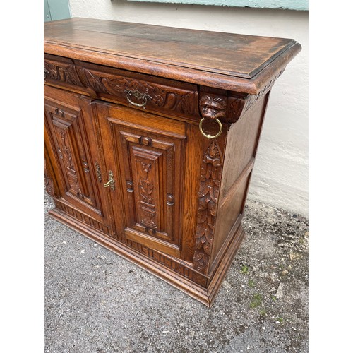 55 - Continental Carved Decoration Sideboard . 50 x 110 x 98 cms