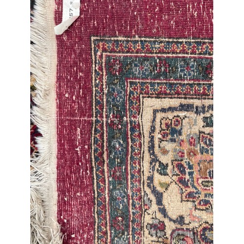 91 - Large Decorative Ground Hand Made Rug. 300 x 203 cms