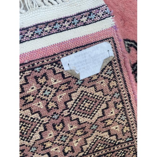 48 - Decorative Ground Rug With Central Pattern. 185 x 118 cms