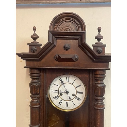 86 - Vintage Cased Two Hole Wall Clock With Key And Pendulum. 114 x 36 x 20 cms