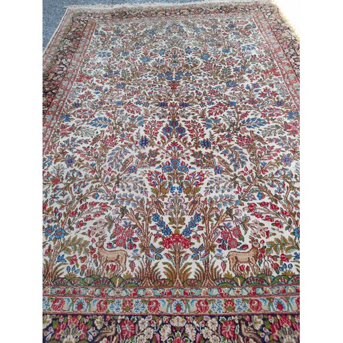 84 - Large Red Ground Rug with Tree of Life style design. 390cm x 275cm