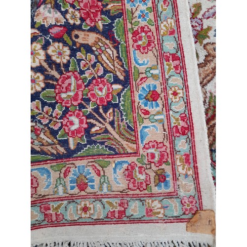 84 - Large Red Ground Rug with Tree of Life style design. 390cm x 275cm