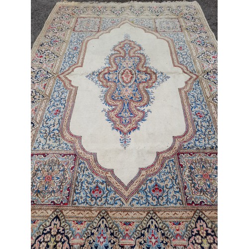 89 - Large Handmade Cream Ground Rug with Central Motif, 340cm x 222cm