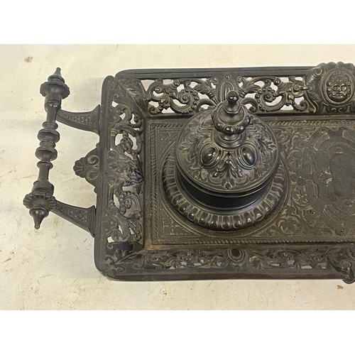 469 - French Bronzed Two Handled Desk Top Inkwell With Pierced Decoration. 40 x 16 cms