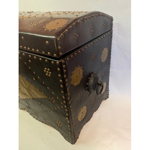 46 - A Leather And Studwork / Metalwork  Domed Top Trunk. 77 x 40 x 54 cms