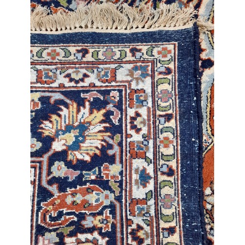 94 - Handmade Indian Blue & Brown Ground Rug, 343cm x 253cm