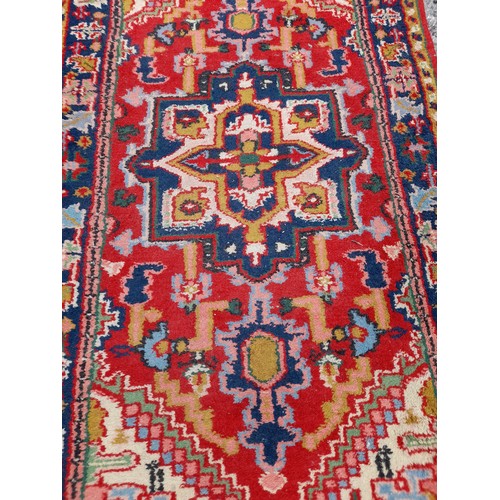 95 - Handmade Small Red Ground Rug, 139cm x 73cm