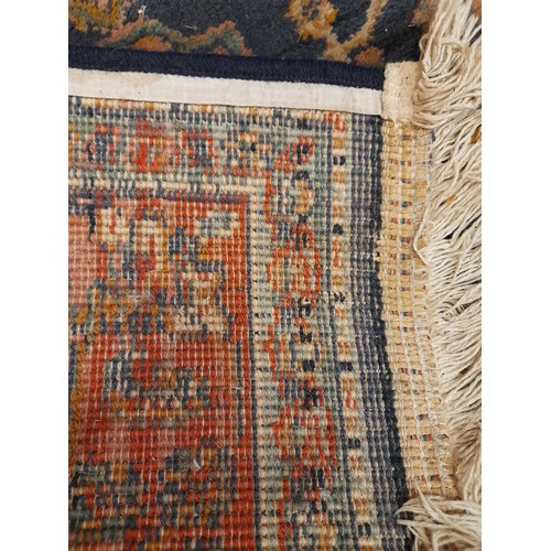 81 - Small Blue ground Rug. 150cm x 93cm