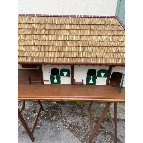 447 - Large Continental Scratch Built Wood Stable Block Model With Thatched Roof And Base Including Trestl... 