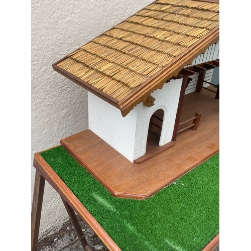 447A - Continental Scratch Built Wood Model Of A Stable Block With Thatched Roof And Lighting With A Green ... 