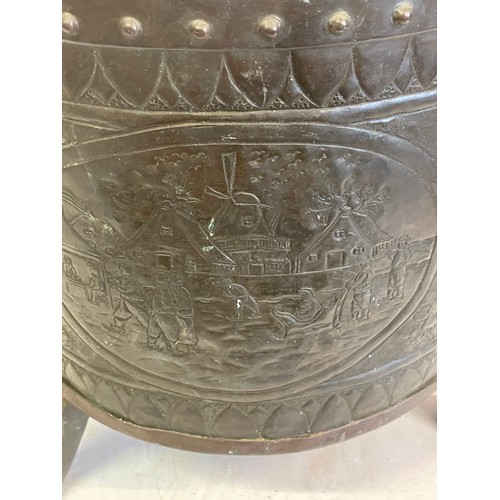 63 - Antique Copper Log Bucket With Lion Paw Feet And Lion Head Handles With Embossed Decoration. 44 x 39... 