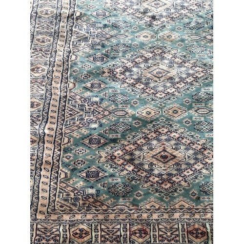 86 - Handmade Blue Ground Rug, 233cm x 166cm