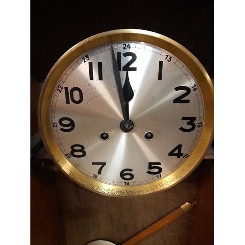 623 - Continental Two Hole Wall Clock with Pendulum.