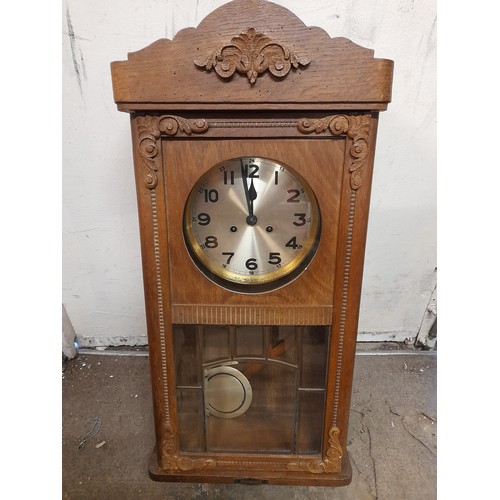 623 - Continental Two Hole Wall Clock with Pendulum.