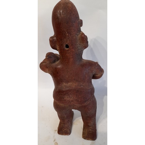 215 - Large Clay Fired figure of a man, Possibly South American. 43cm high