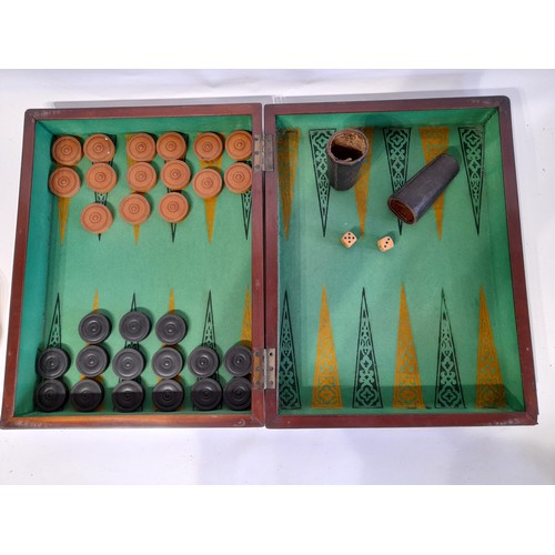 222 - Vintage  Wooden Box containing a Backgammon game including wooden counters, leather die cups and 2 d... 