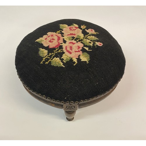 20 - Antique Needlepoint Circular Footstool Black With Floral Design. 29cm Diameter 18cm Height