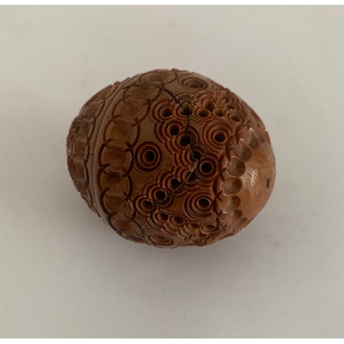 144 - Antique Carved Conquilla Nut af
4 cms diameter x 5.5 cms h