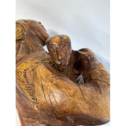 528 - Large Vintage Carved Wooden Tribal Statue of a Man Carrying an Animal. 61cm Height