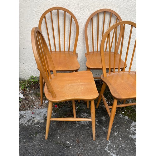 47 - Four Light Ercol Stick back Chairs (4)