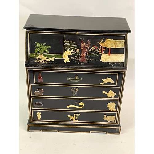 66 - Miniature Chinese Bureau  Decorated With Hardstone Figural Decoration And Drawers. 25 x 13 x 27 cms