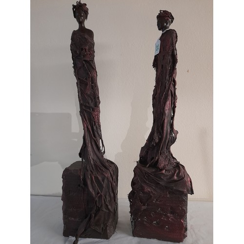 35 - 2 Large Mixed material figures of a man and woman, largest standing 67cm high