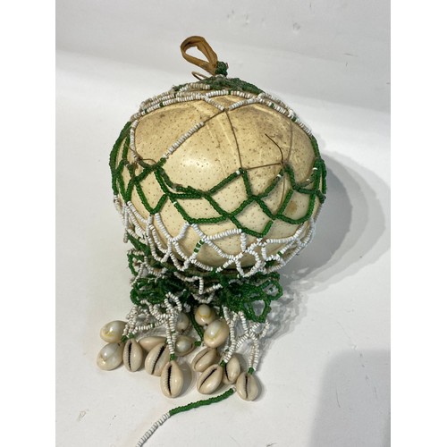 70 - Antique Netted Ostrich Egg With Traded Bead Decoration.. 23cm x 16cm x 13cm