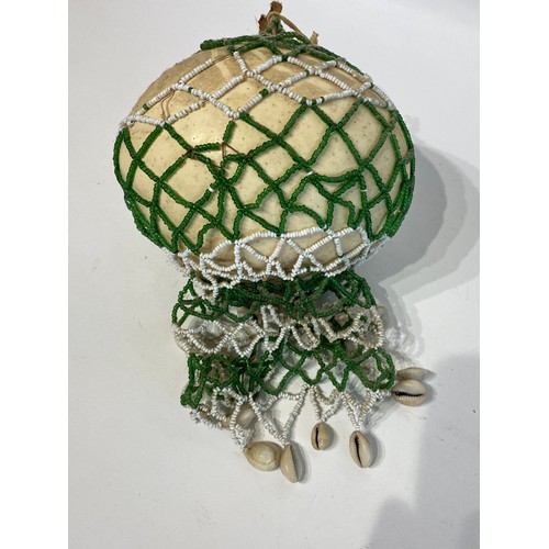 71 - Similar to Previous Lot. Antique Netted Ostrich Egg With Traded Bead Decoration.. 23cm x 16cm x 13cm