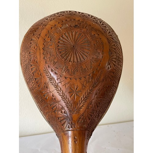 218 - Carved Wood Musical Instrument With Horse Head Finial. 65 cms