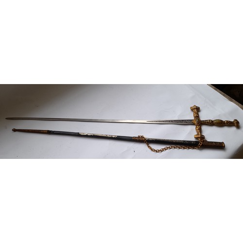 468 - Decorative sword and Scabbard, 83cm long