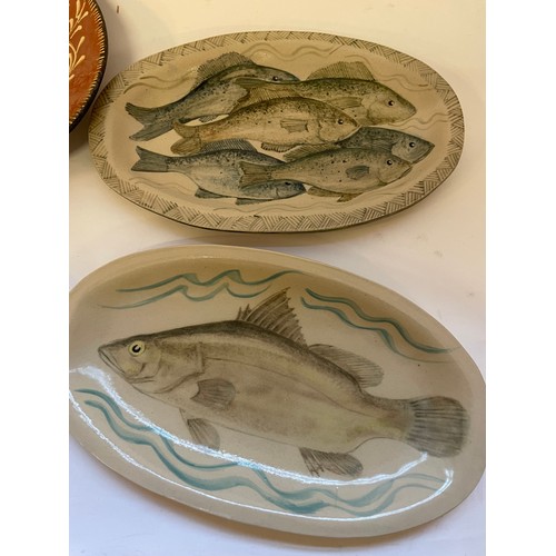 353 - Four Studio Pottery Plates Of Fish Design. Largest Plate 37.5 cms (4)