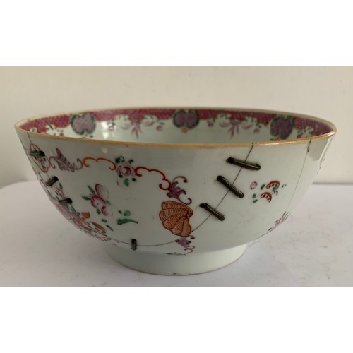 131 - Antique Famille Rose Chinese Bowl Having Staple Restoration
20 cms diameter x 9 cms h