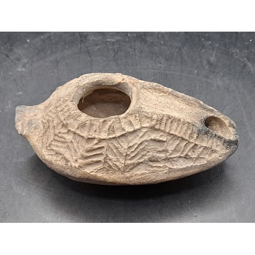 352 - A  Roman Terracotta oil Lamp 9.5cm long