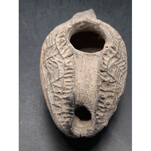 352 - A  Roman Terracotta oil Lamp 9.5cm long