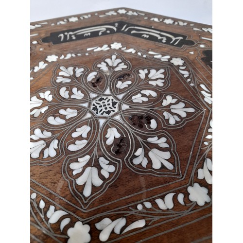 25 - A Middle Eastern, Moorish side table with Mother of Pearl inlay, 57cm high x 46cm wide