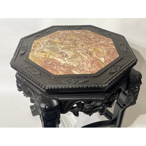 34 - Chinese Octaganal Marble Top Table. 43 x 43 x 46 cms