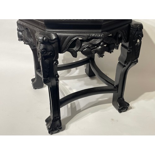 34 - Chinese Octaganal Marble Top Table. 43 x 43 x 46 cms