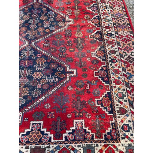 83 - Large Decorative Hand Made Ground Rug. 340 x 248 cms