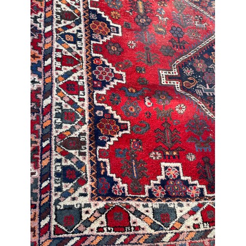 83 - Large Decorative Hand Made Ground Rug. 340 x 248 cms