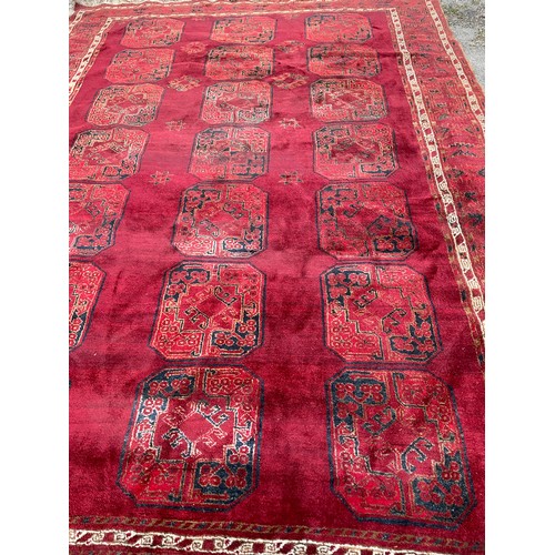 90 - Large Decorative Hand Tied Rug. 325 x 230 cms