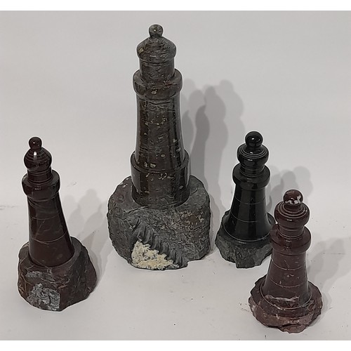 628 - 4 x Granite ornamental lighthouses largest 22cm, smallest 13cm. (4)