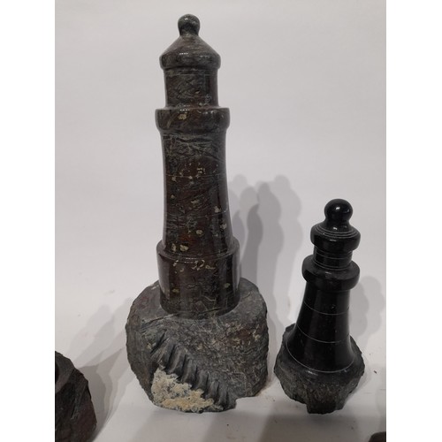 628 - 4 x Granite ornamental lighthouses largest 22cm, smallest 13cm. (4)