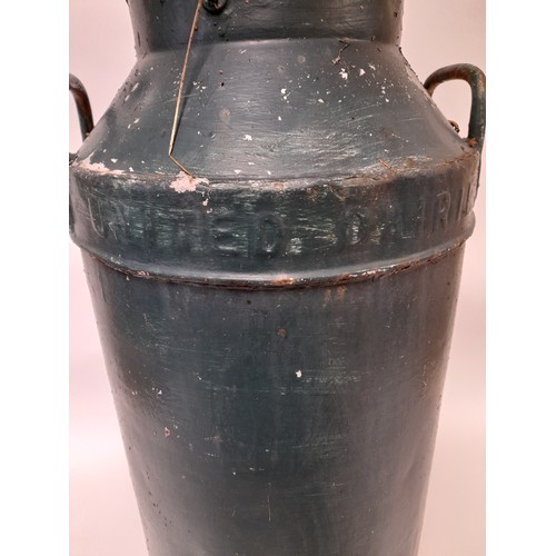 165 - Green painted United Dairies milk churn 74cm high