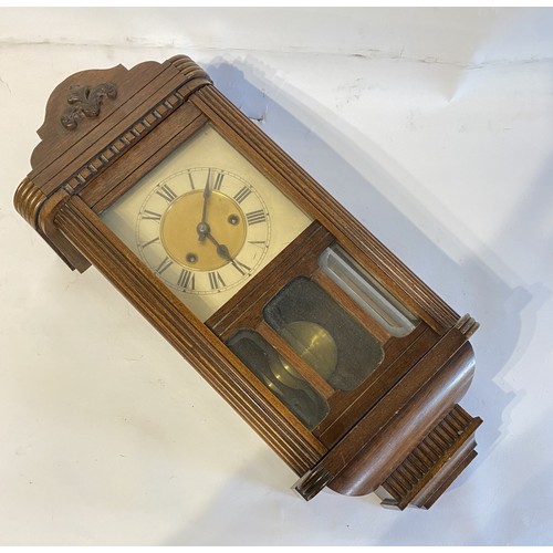 108 - Two Whole Wood Framed  Wall Clock. 54cm x 24cm x 13cm