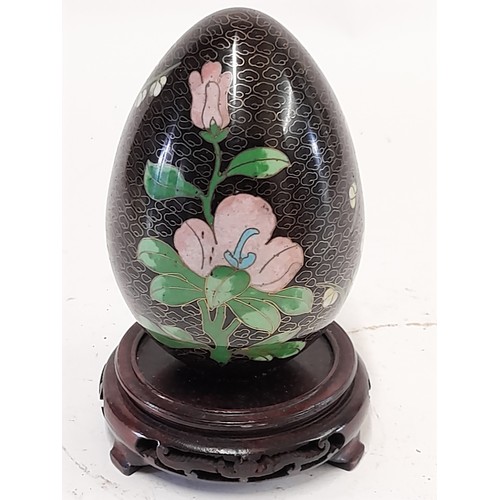 112 - Oriental Cloisonné Style  Egg on wooden stand , 18cm high