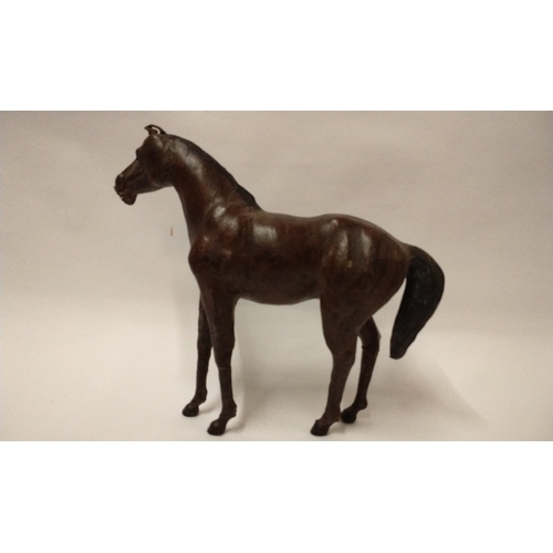 257 - Vintage leather clad decorative horse, 31cm High x 33cm long