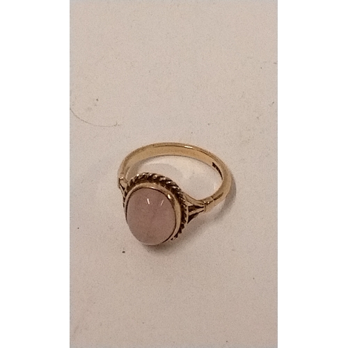 244A - 9ct Gold Ring with mounted stone marked 375