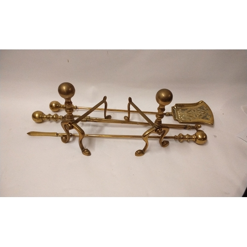 330 - Fire side companion set of Brass Poker, Tongs and Shovel and a pair of brass dogs